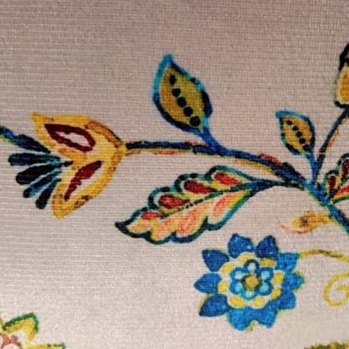 Floral Haven Printed Suede Premium Fabric Cushion Cover Floral pattern with a mix of blue, yellow and orange flowers on a white background