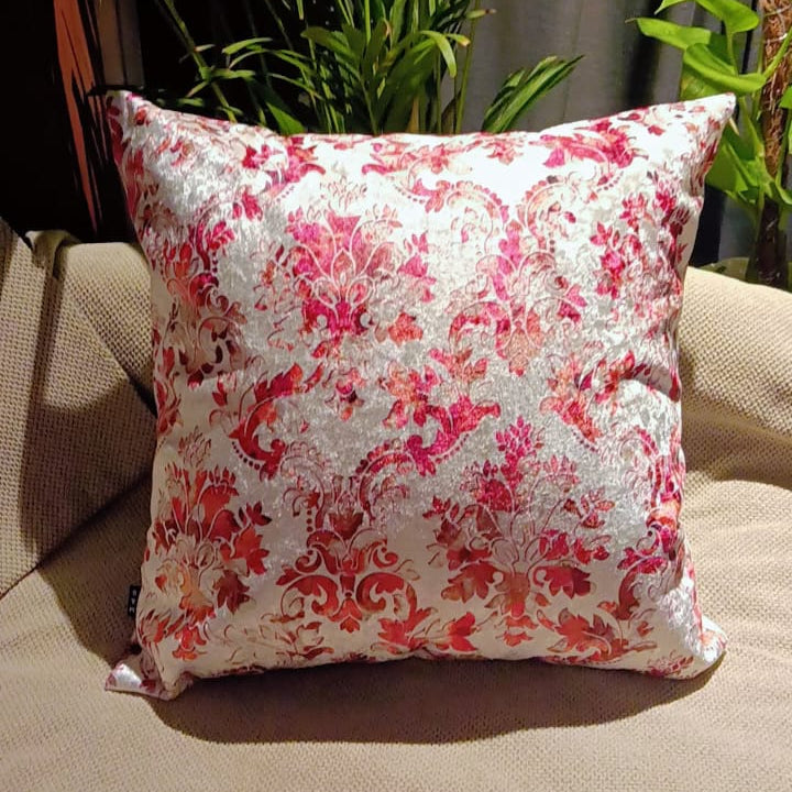 Rosy oasis Printed Suede Premium Fabric Cushion Cover  Floral pattern with shades of pink and red on a white background